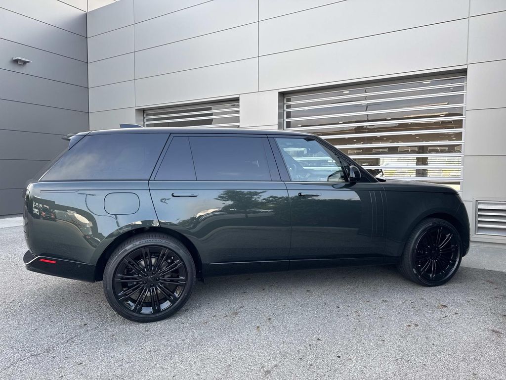New 2026 Green Land Rover SE image 8