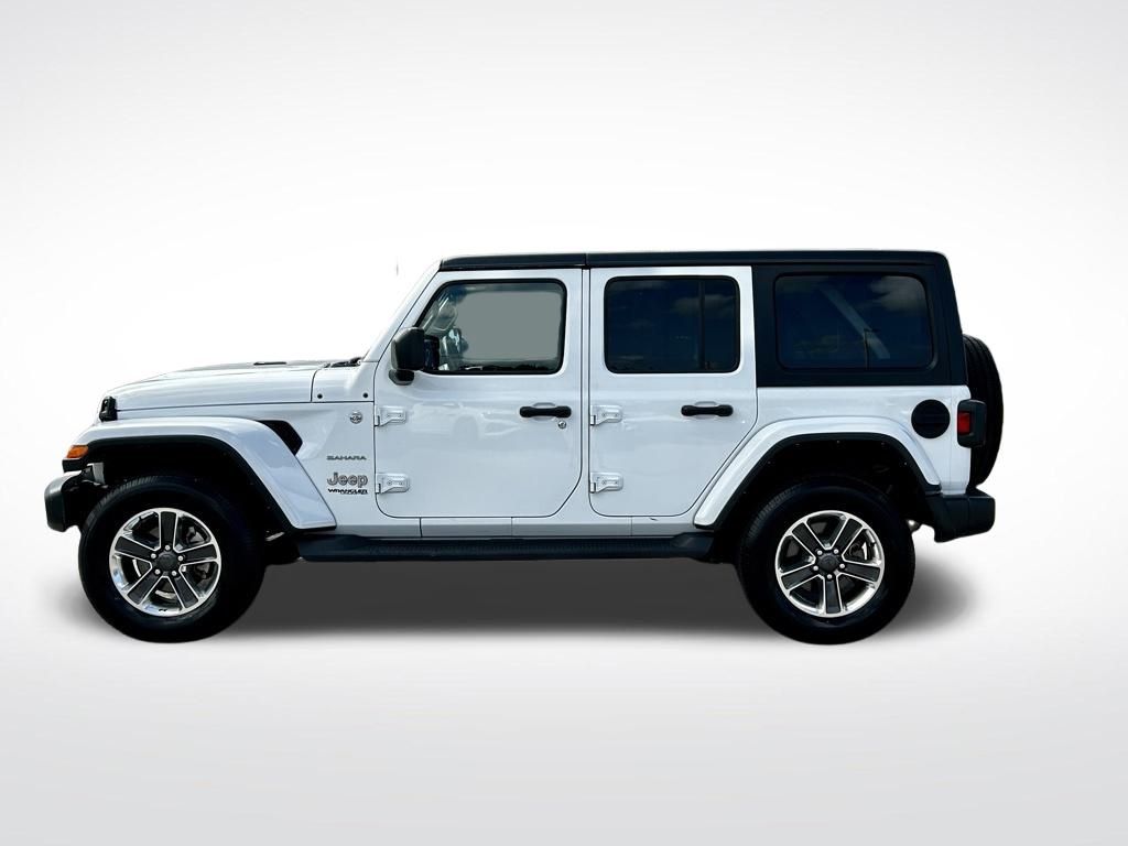 Used 2022 Jeep Wrangler Unlimited Sahara with VIN 1C4HJXEN1NW270291 for sale in Miami, FL