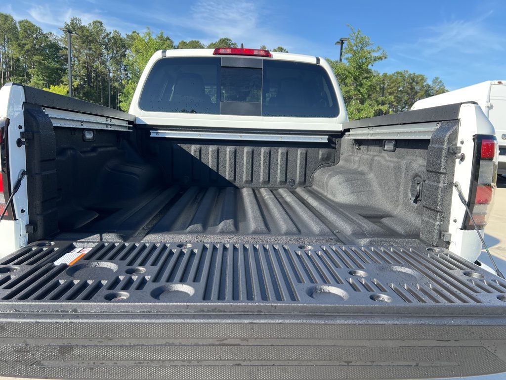 2025 Glacier White Nissan Frontier SV RWD Truck