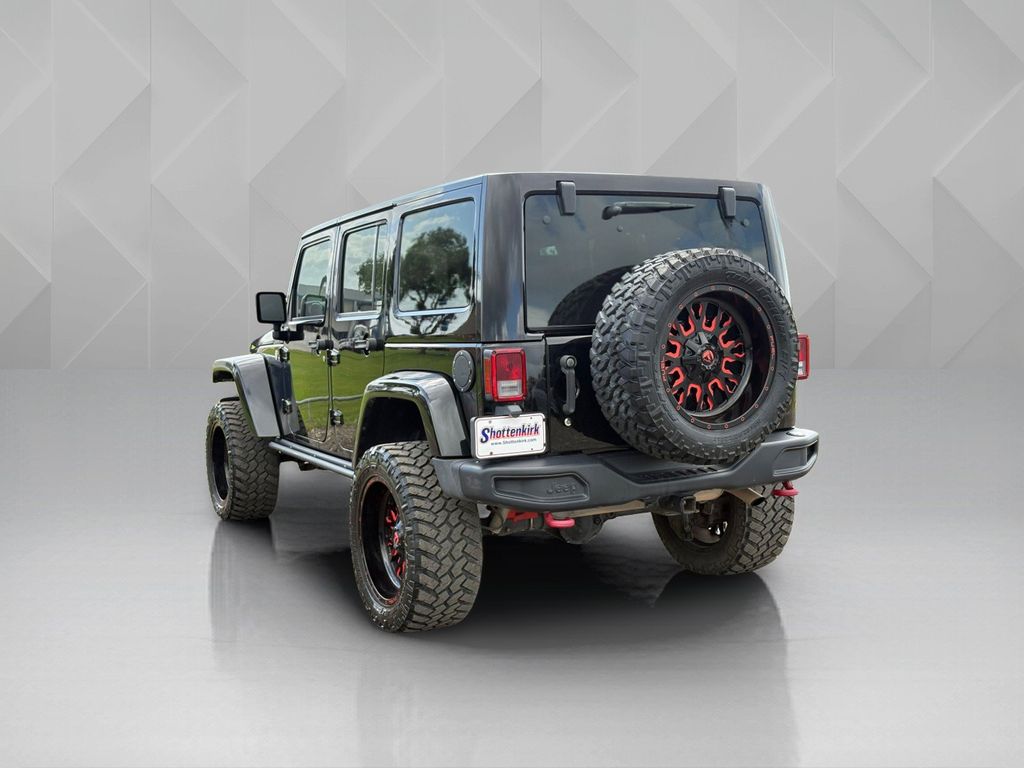 2016 Jeep Wrangler Unlimited Rubicon Black at North Houston Mitsubishi