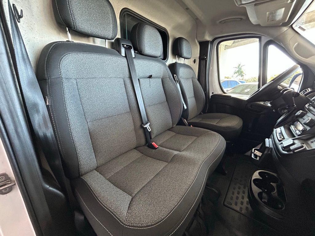 Used 2024 Bright White Clearcoat Ram High Roof image 28