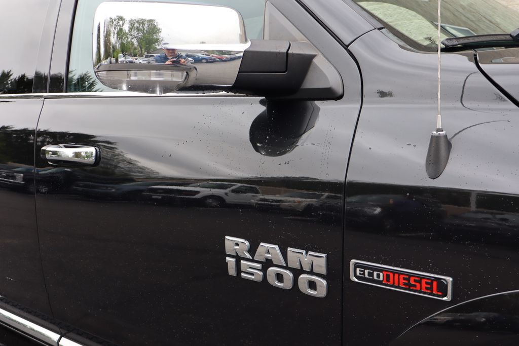 used 2015 Ram 1500 car, priced at $18,500