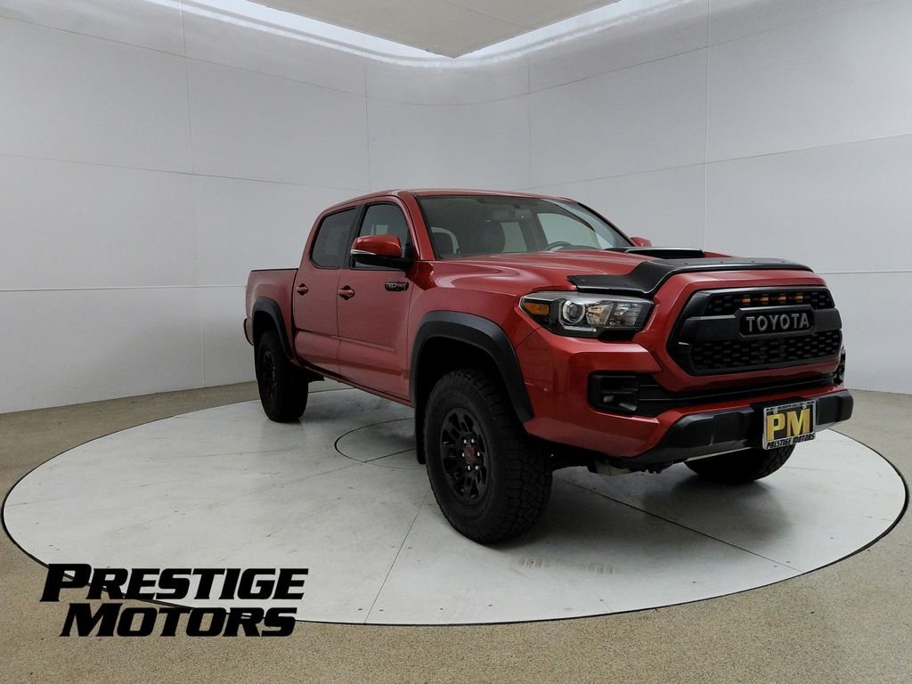 Red 2017 Toyota Tacoma Pickup Truck Four-Wheel Drive 6-Speed Automatic