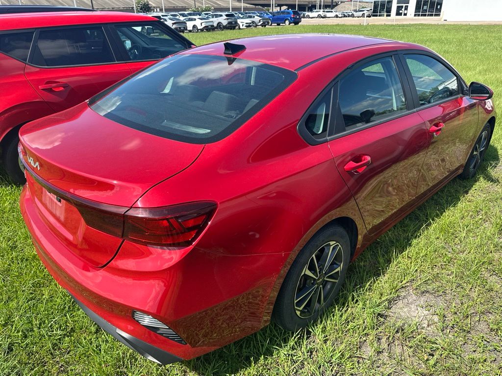 2024 Kia Forte LXS Red at DeMontrond Auto Country