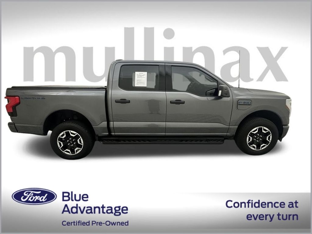 Certified 2023 Ford F-150 Lightning XLT with VIN 1FTVW1EL3PWG23164 for sale in Kissimmee, FL