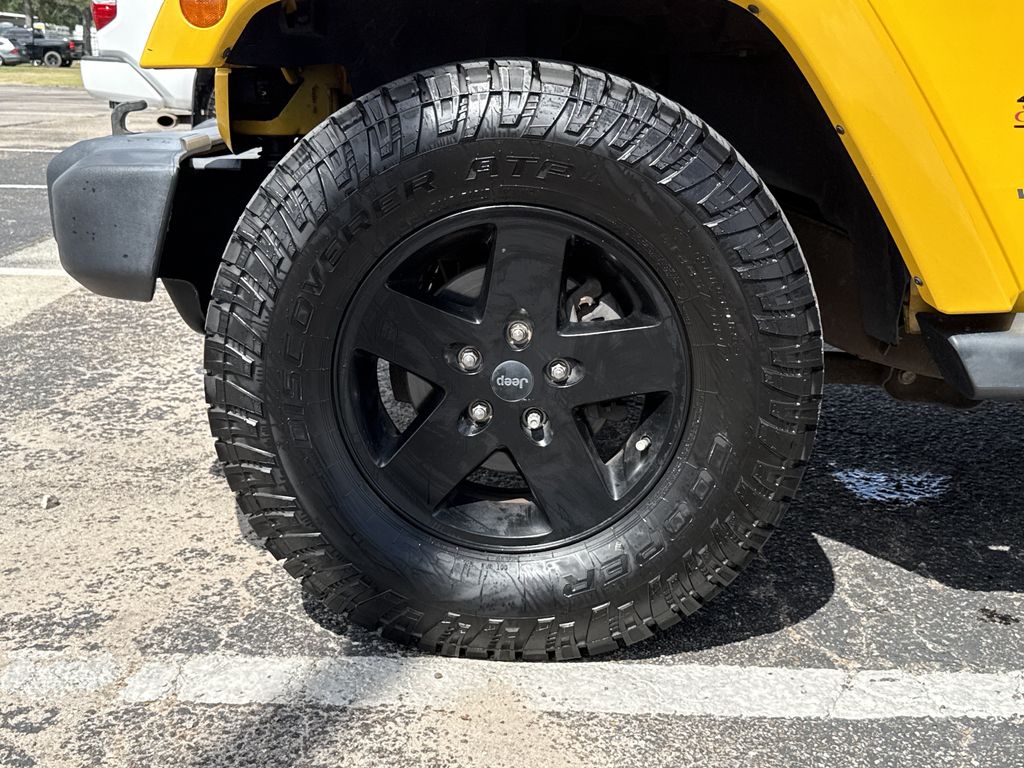 2015 Jeep Wrangler Unlimited Sahara Yellow at Parkway Family Mazda