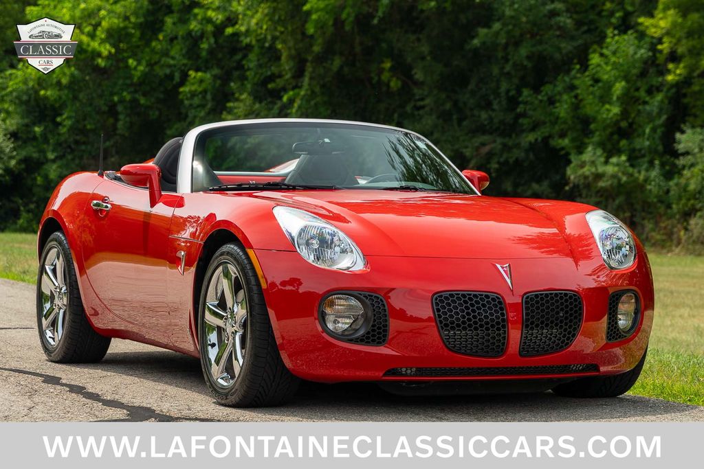 Aggressive Victory Red 2007 Pontiac Solstice Convertible Rear-Wheel Drive 5-Speed Automatic