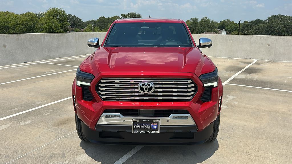 2026 Toyota Tacoma Hybrid Limited Red at EAG Ford Navasota