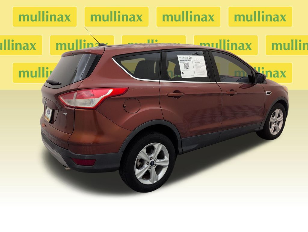 Used 2016 Orange Ford SE image 4