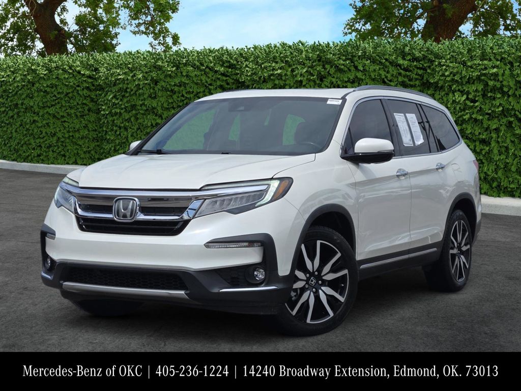 White Diamond Pearl 2019 Honda Pilot Touring FWD with Rear Captain's Chairs SUV / Crossover Front-Wheel Drive 9-Speed Automatic