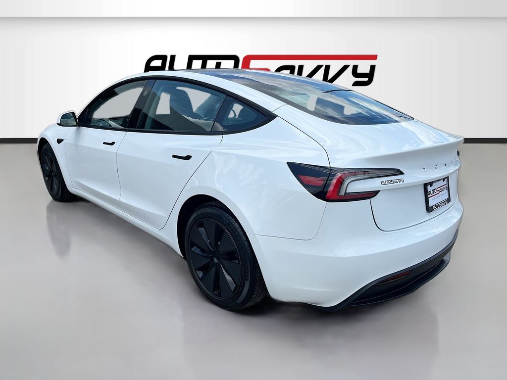 2025 Tesla Model 3 Long Range White at AutoSavvy Houston Northwest
