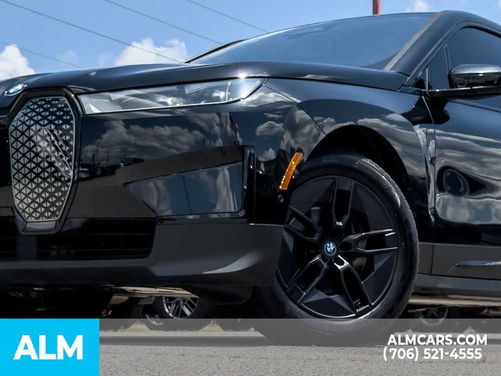 Used 2024 Black BMW xDrive50 image 11