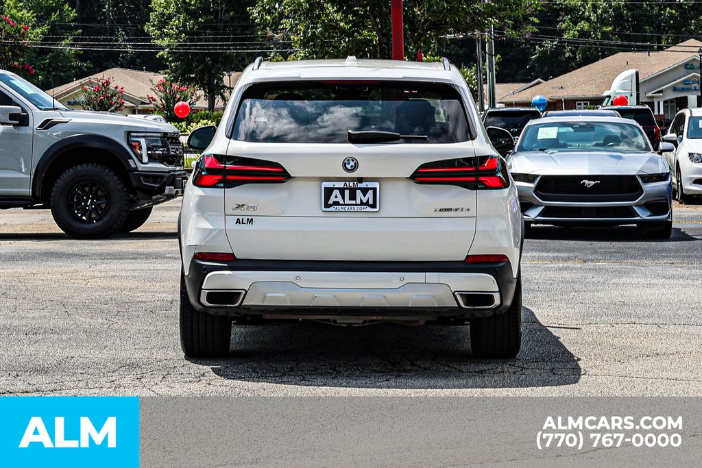 Used 2025 White BMW xDrive50e image 12