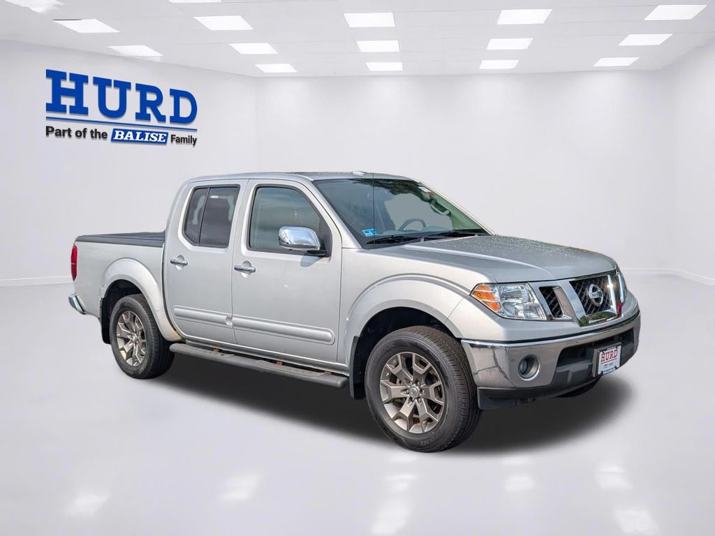 Brilliant Silver 2014 Nissan Frontier Pickup Truck Four-Wheel Drive 5-Speed Automatic Overdrive