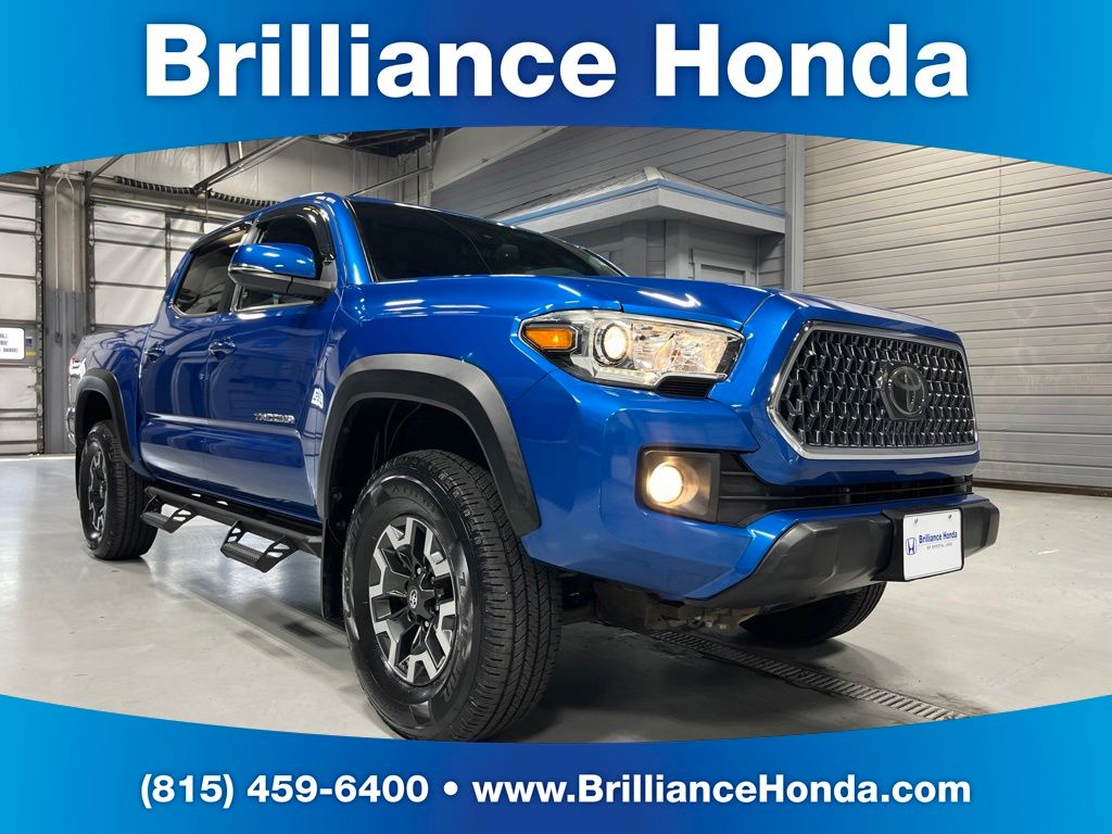 Blue 2018 Toyota Tacoma Pickup Truck Four-Wheel Drive 6-Speed Manual