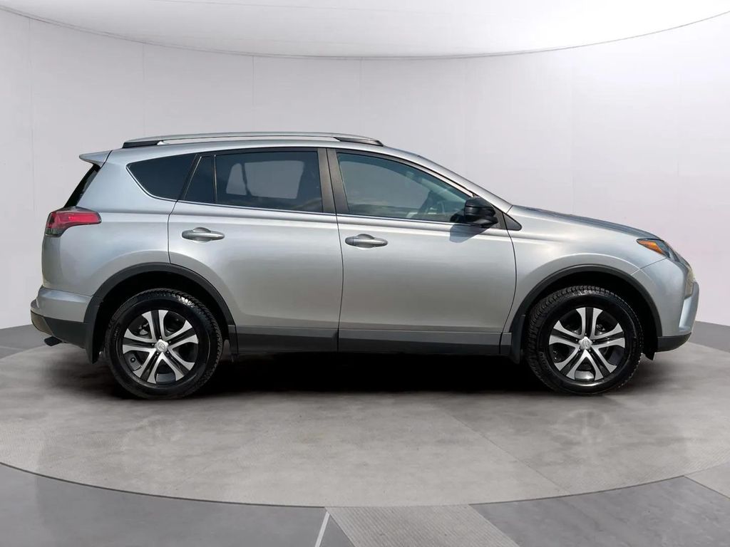 Used 2018 Silver Sky Metallic Toyota LE image 6