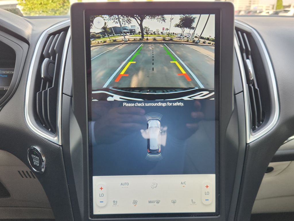 2024 Ford Edge Titanium Blue at DeMontrond Ford