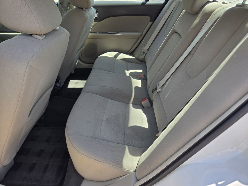 2012 Ford Fusion Hybrid Base White at Shottenkirk Kia Fort Bend