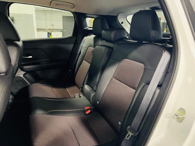 2026 Aspen White/Super Black Nissan Kicks SR FWD SUV