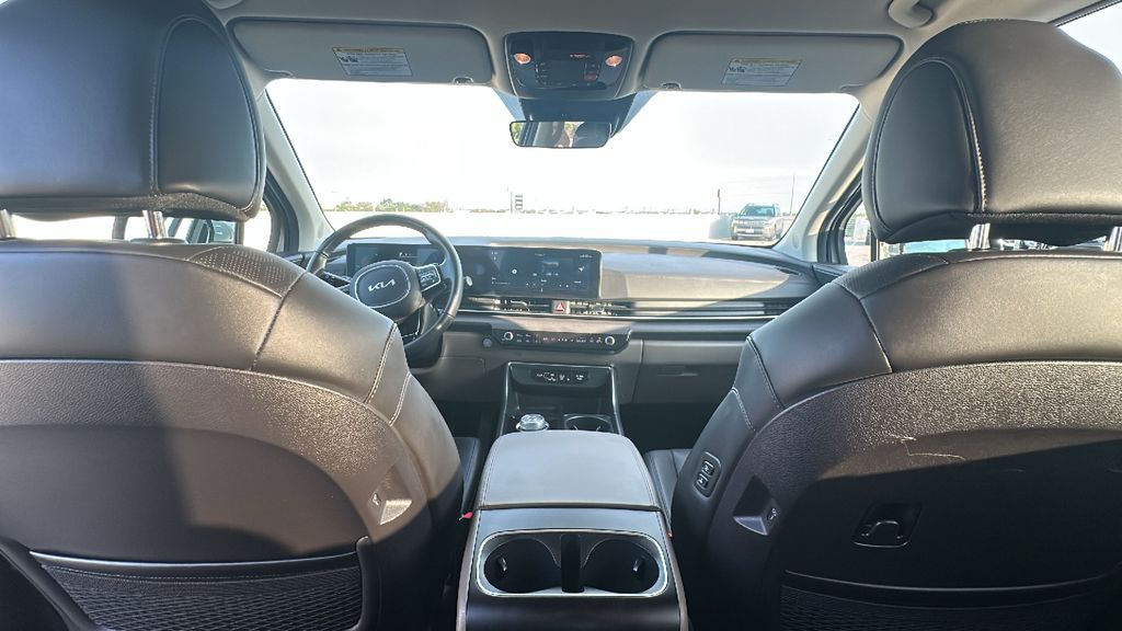 2026 Kia Carnival Hybrid EX White at Shottenkirk Kia Fort Bend