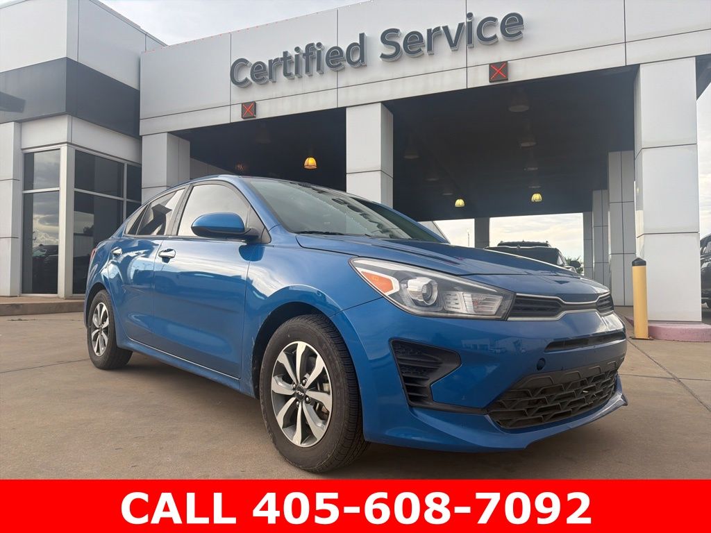 Sporty Blue 2023 Kia Rio S FWD Sedan Front-Wheel Drive Continuously Variable Transmission