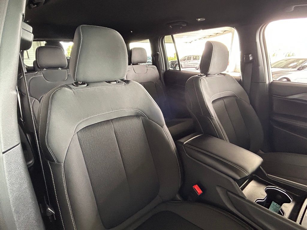 Used 2025 Bright White Clearcoat Jeep Laredo image 34