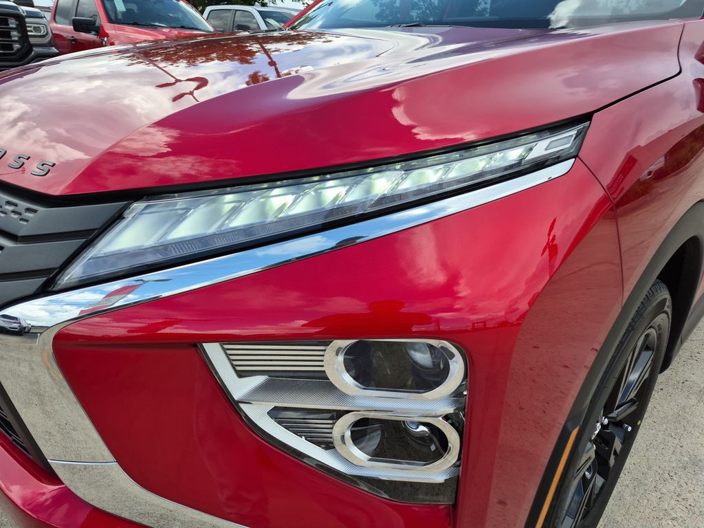 2025 Mitsubishi Eclipse Cross LE Red at DeMontrond Gulf Freeway