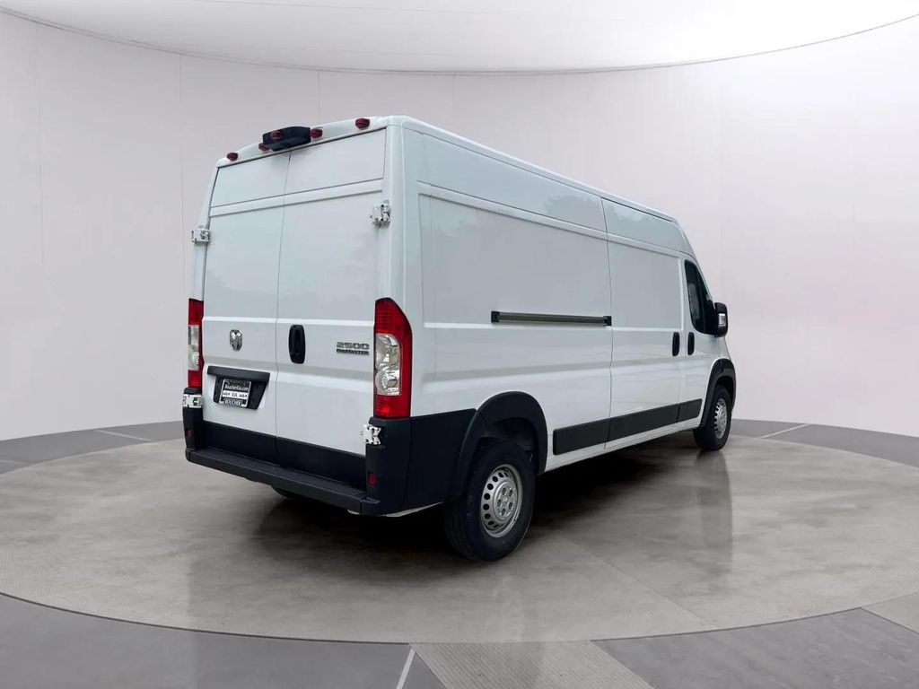 Used 2025 Bright White Clearcoat Ram High Roof image 5