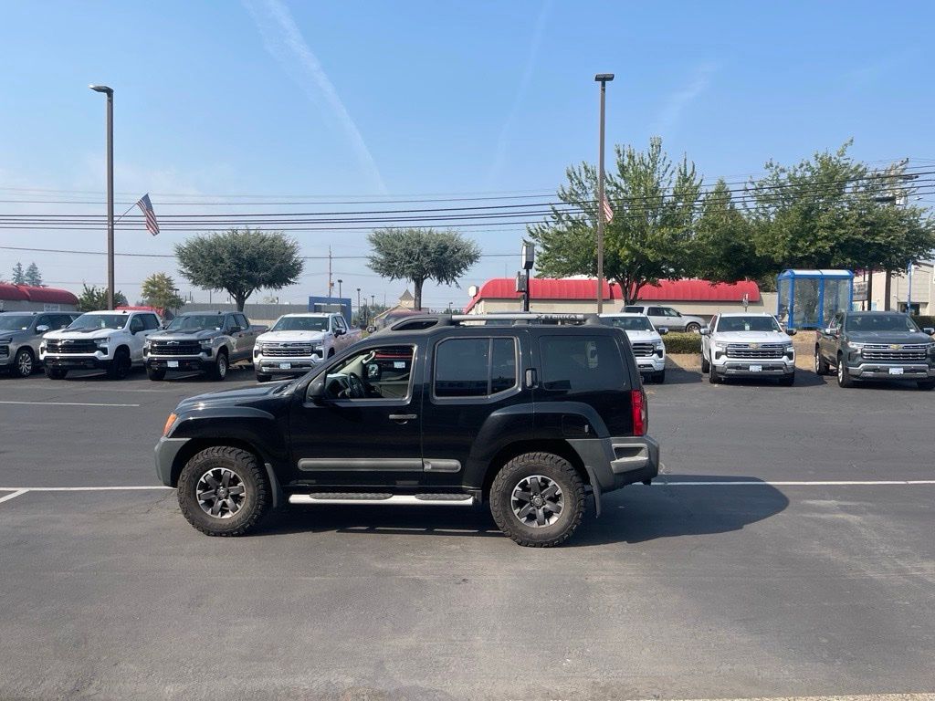 Super Black 2015 Nissan Xterra SUV / Crossover 6-Speed Manual