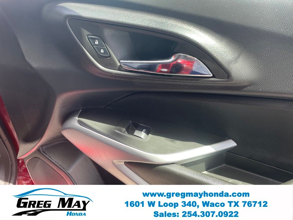 2025 Chevrolet Trax LS Red at Greg May Honda