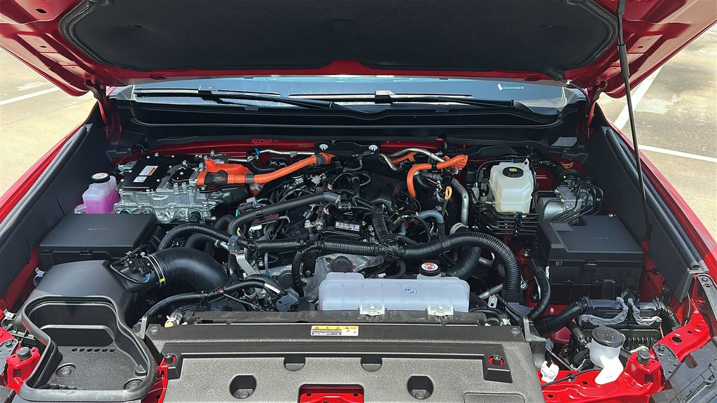 2026 Toyota Tacoma Hybrid Limited Red at EAG Ford Navasota