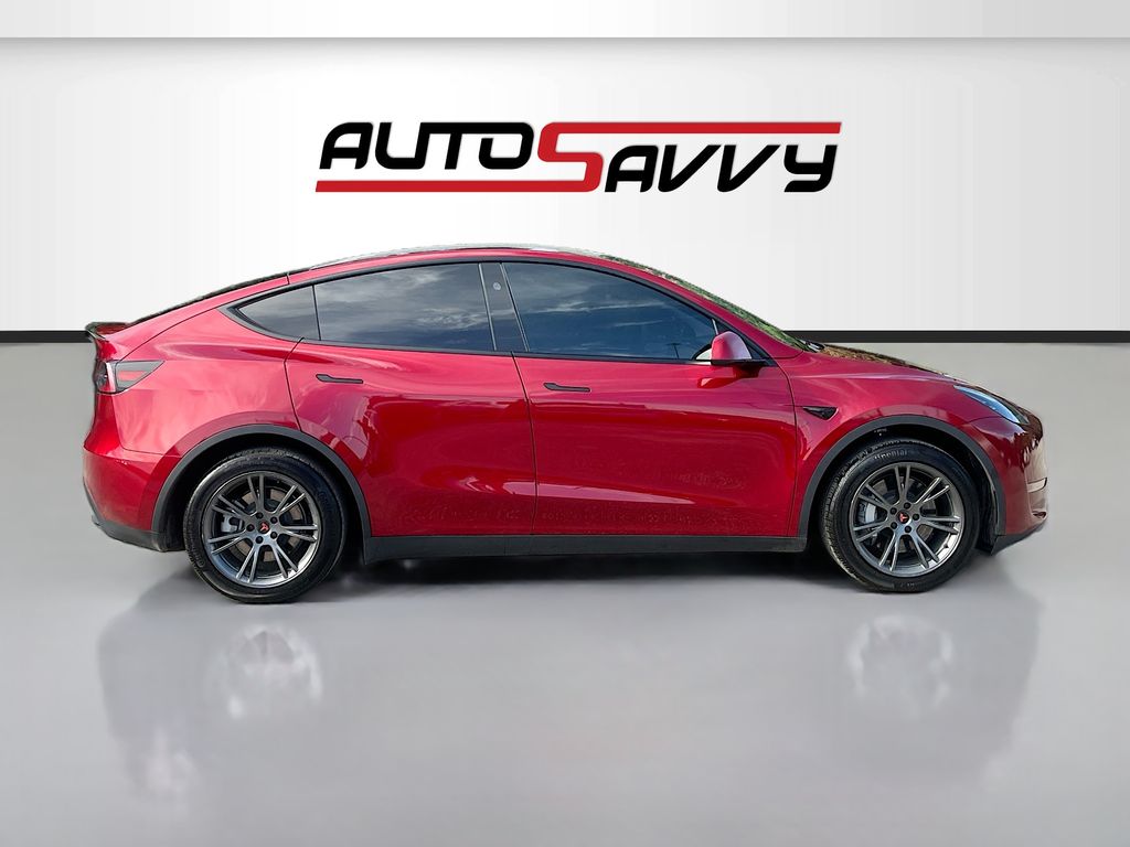 2025 Tesla Model Y Long Range Red at AutoSavvy Houston Northwest