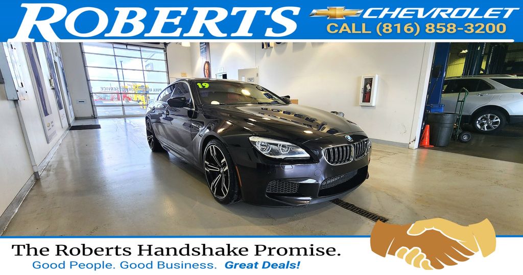Red (Ruby Black Metallic) 2019 BMW M6 Gran Coupe RWD Sedan Rear-Wheel Drive 7-Speed Automatic