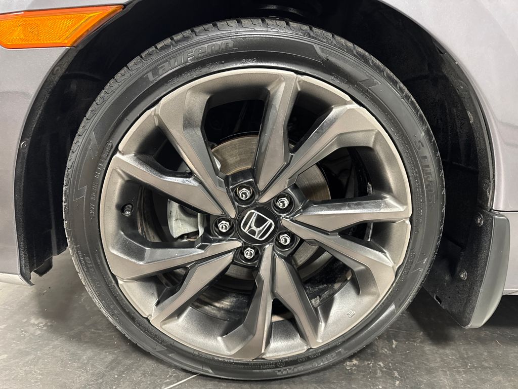 View vehicle photo 3