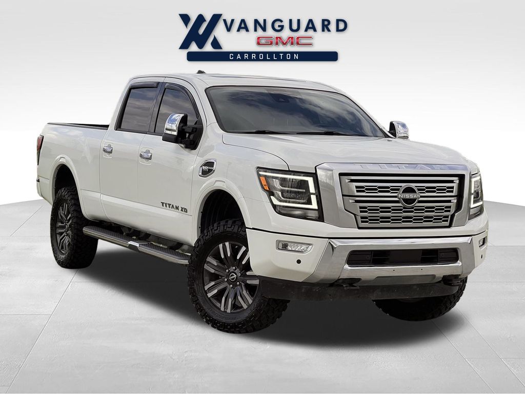 Pearl White 2023 Nissan Titan Pickup Truck Four-Wheel Drive 9-Speed Automatic