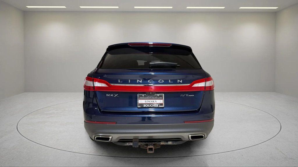 Used 2017 Midnight Sapphire Blue Metallic Lincoln Reserve image 4