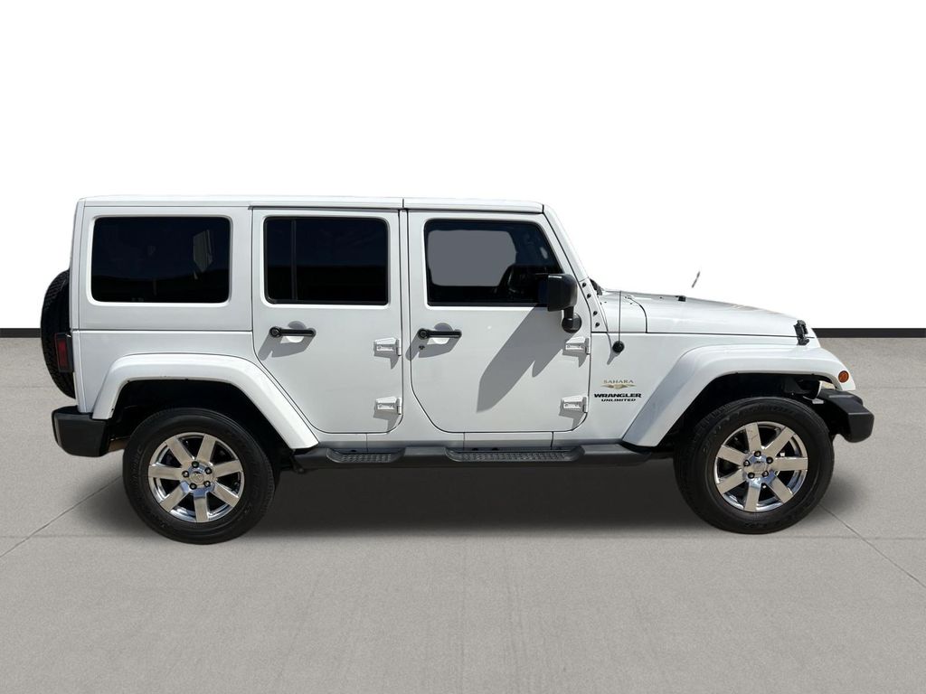 2014 Jeep Wrangler Unlimited Sahara White at Autostrade