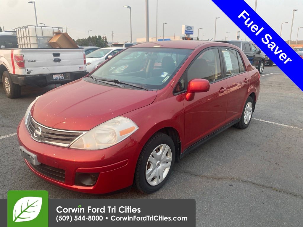 Red Brick 2011 Nissan Versa Sedan Front-Wheel Drive 4-Speed Automatic