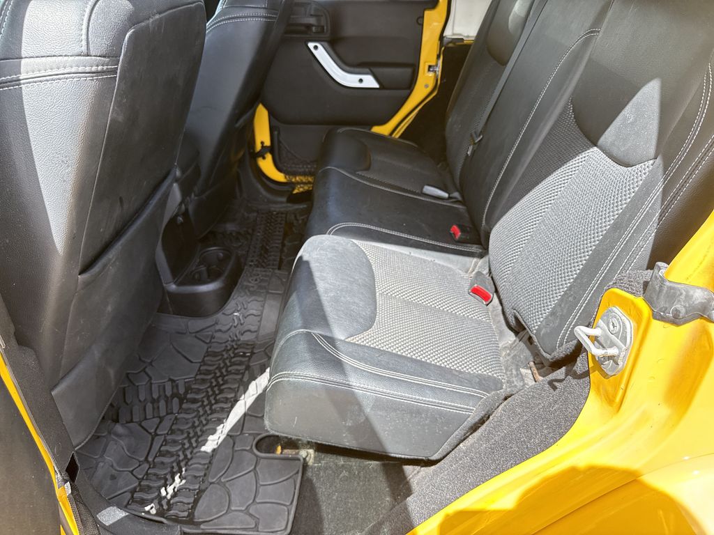 2015 Jeep Wrangler Unlimited Sahara Yellow at Parkway Family Mazda