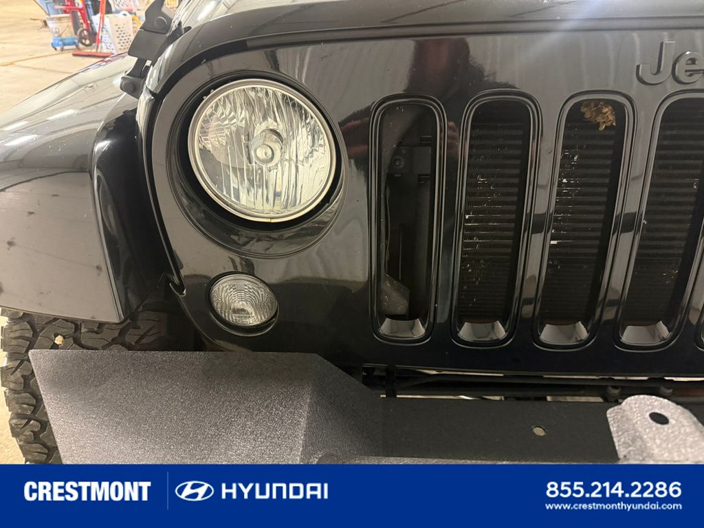 used 2015 Jeep Wrangler car, priced at $17,034