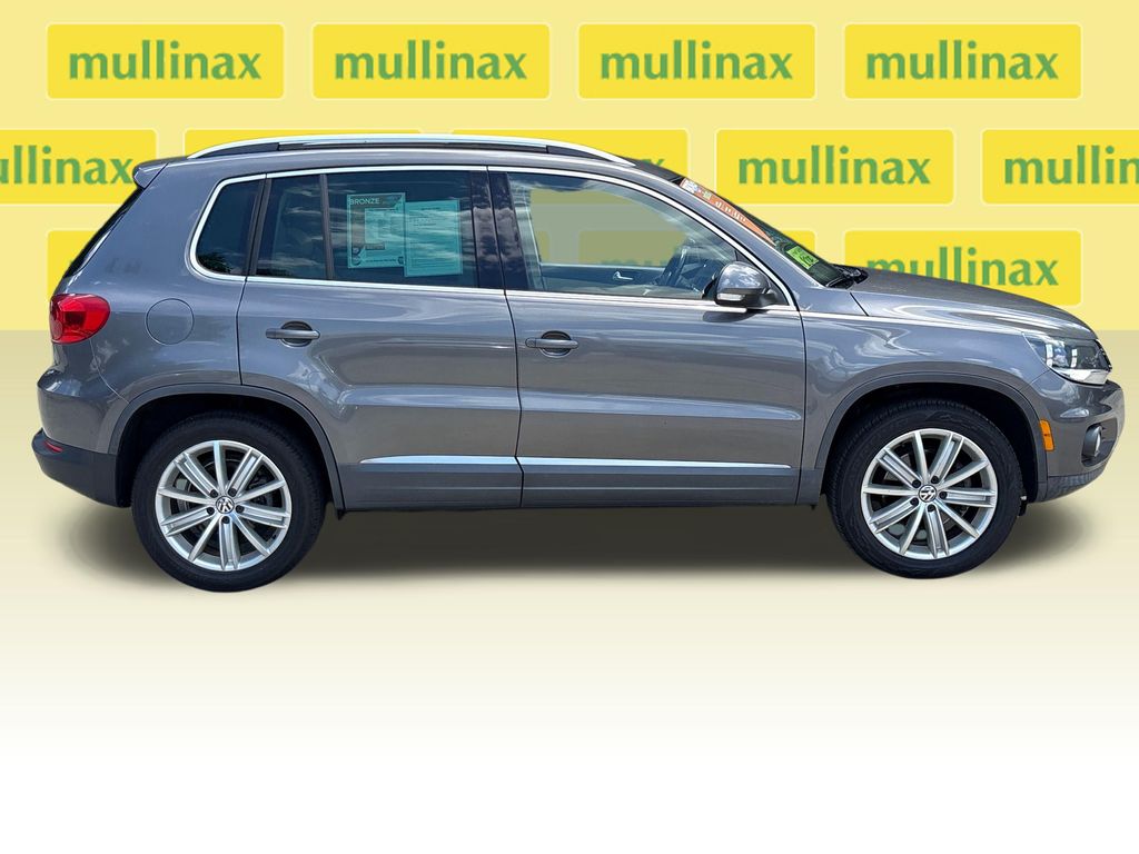 Used 2012 Volkswagen Tiguan SE with VIN WVGAV7AX8CW002778 for sale in New Smyrna Beach, FL