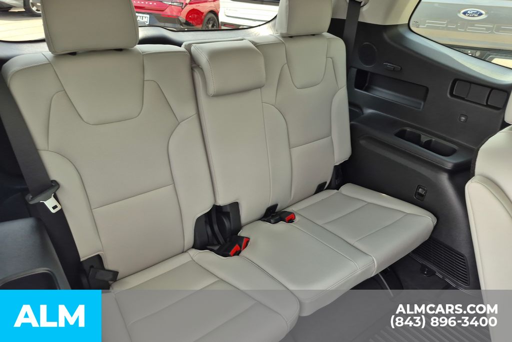Used 2025 Ebony Black Kia SX-Prestige image 23