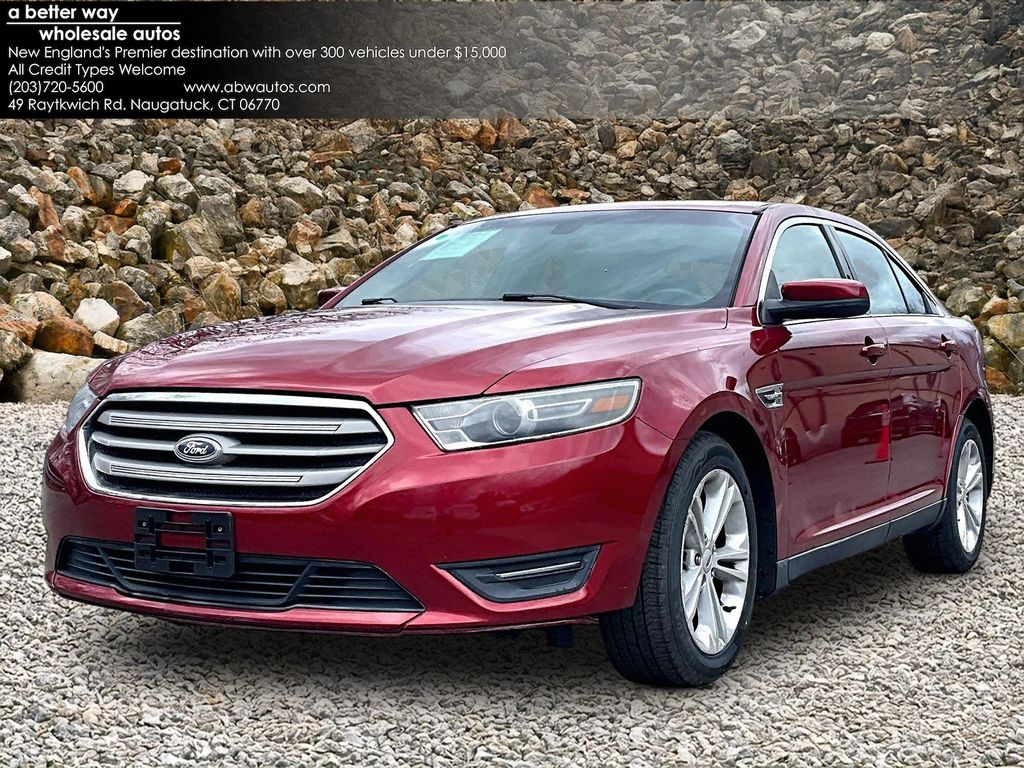 Ruby Red Metallic 2015 Ford Taurus SEL Sedan Front-Wheel Drive 6-Speed Automatic