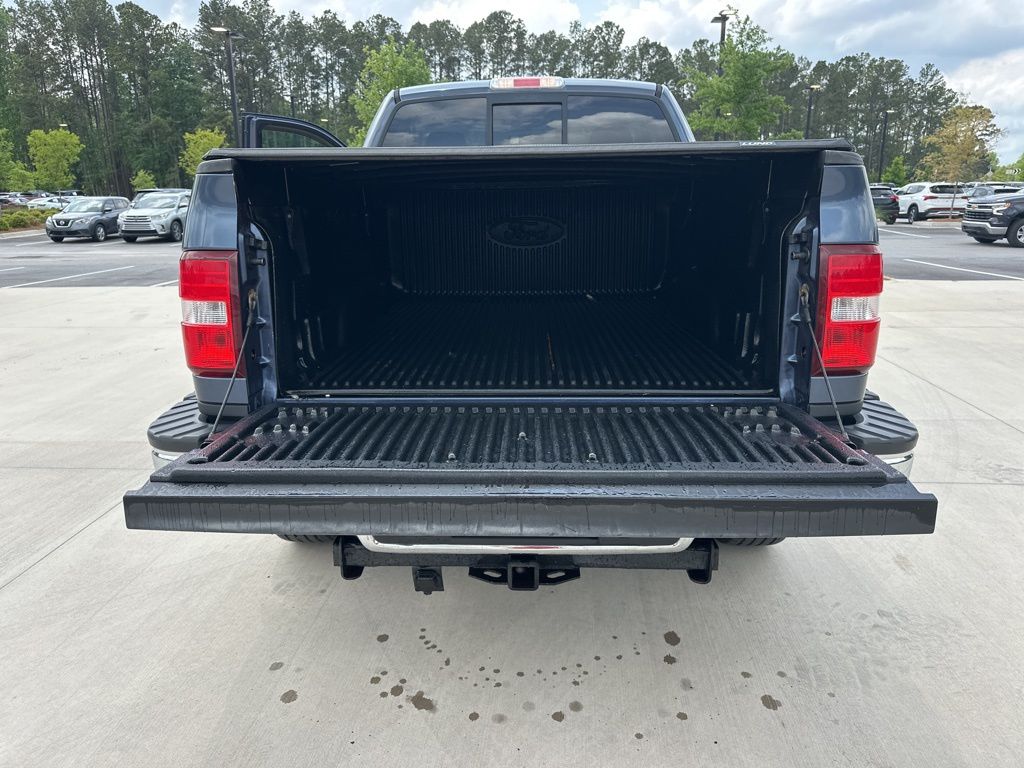 2006 Blue Ford F-150 XLT 4X4 Truck