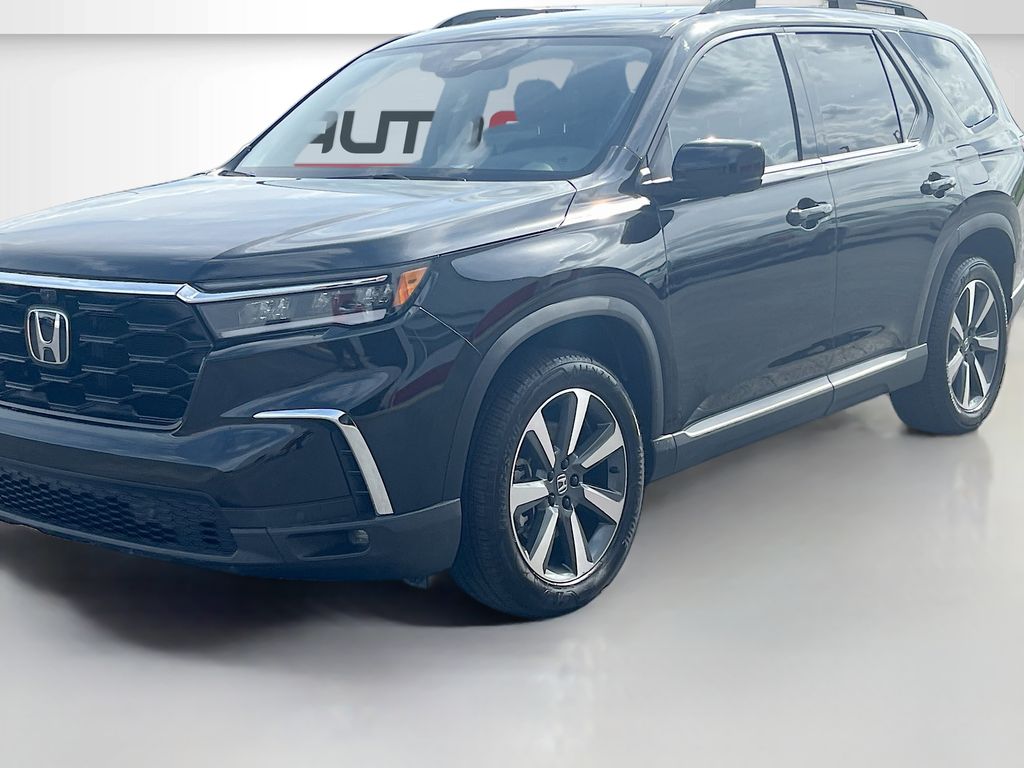 View vehicle photo 3