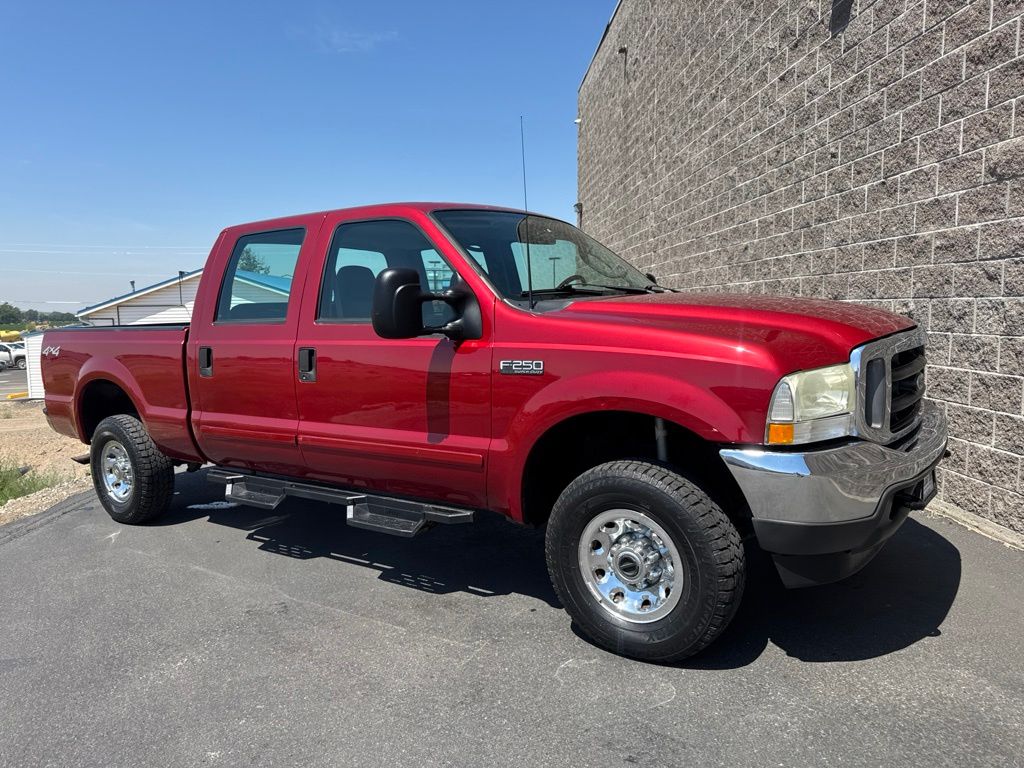 Red 2003 Ford F-250 Super Duty Pickup Truck Four-Wheel Drive 4-Speed Automatic
