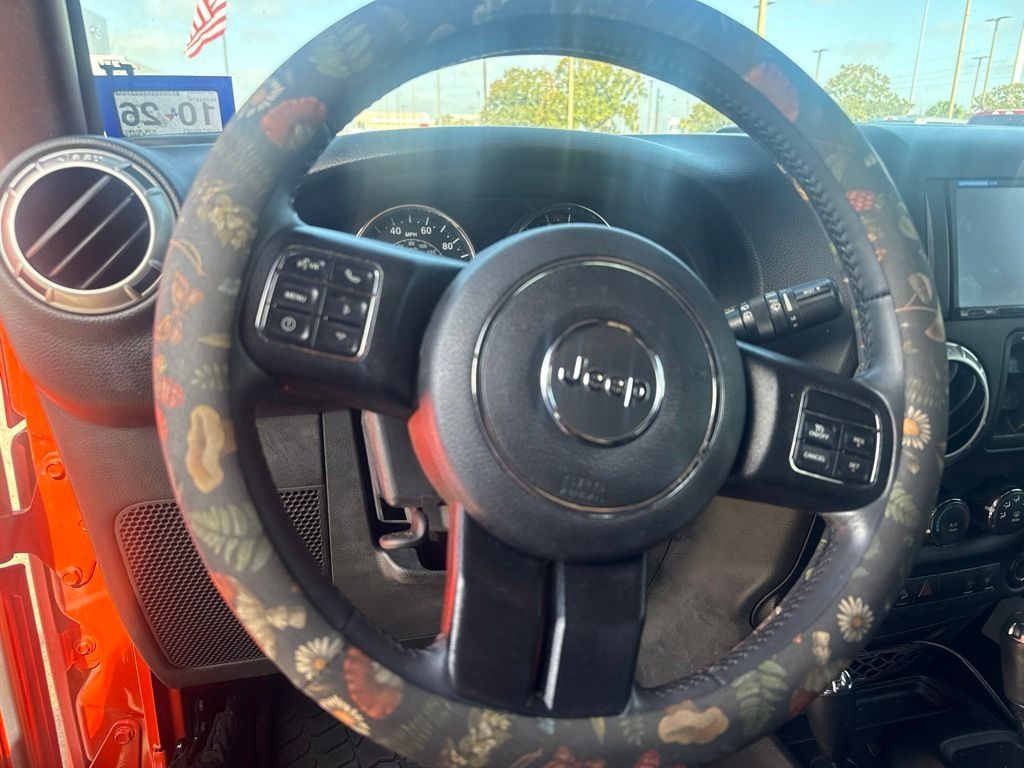 2015 Jeep Wrangler Unlimited Sahara Orange at Emmons Autoplex