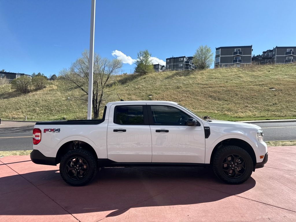 View vehicle photo 4