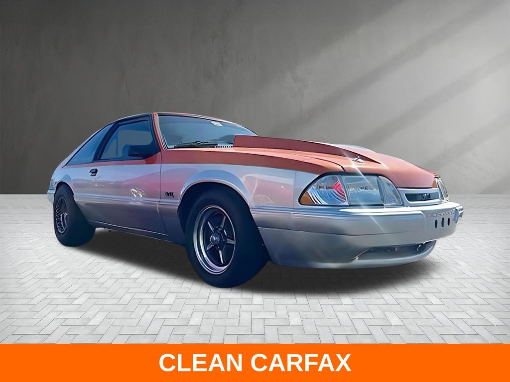 Orange 1993 Ford Mustang Hatchback Rear-Wheel Drive 5-Speed Manual