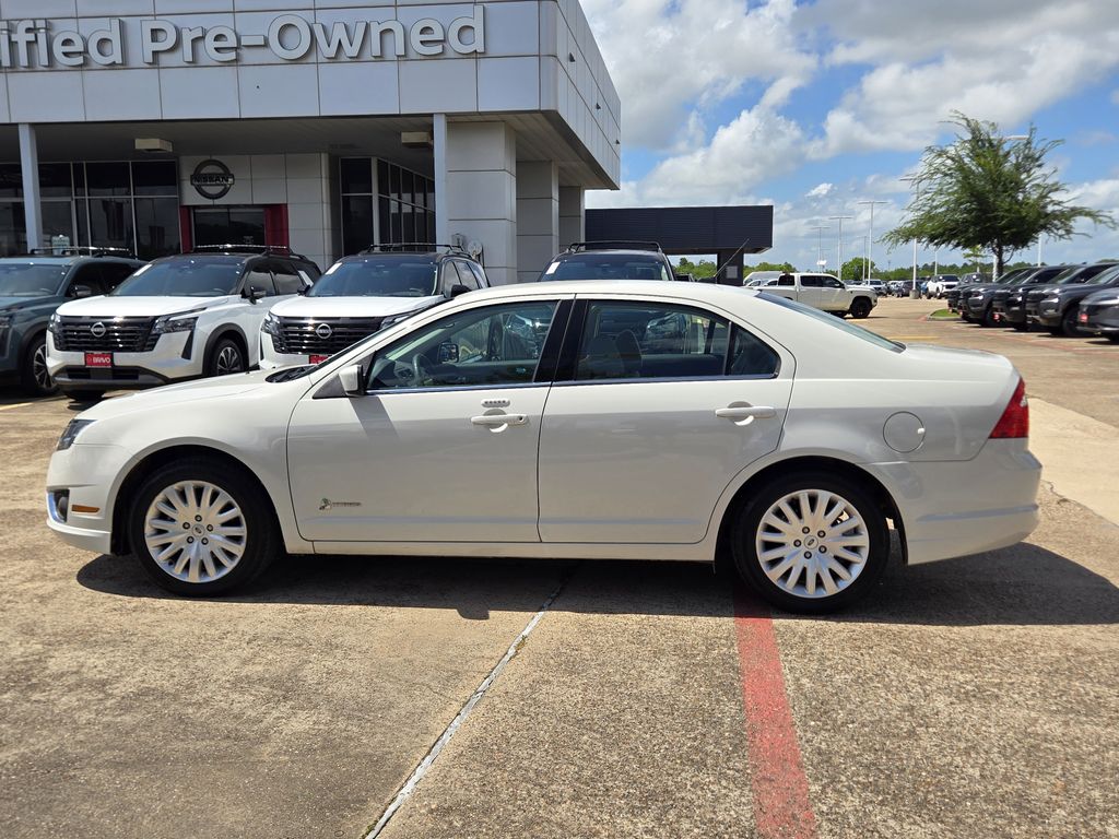 2012 Ford Fusion Hybrid Base White at Shottenkirk Kia Fort Bend
